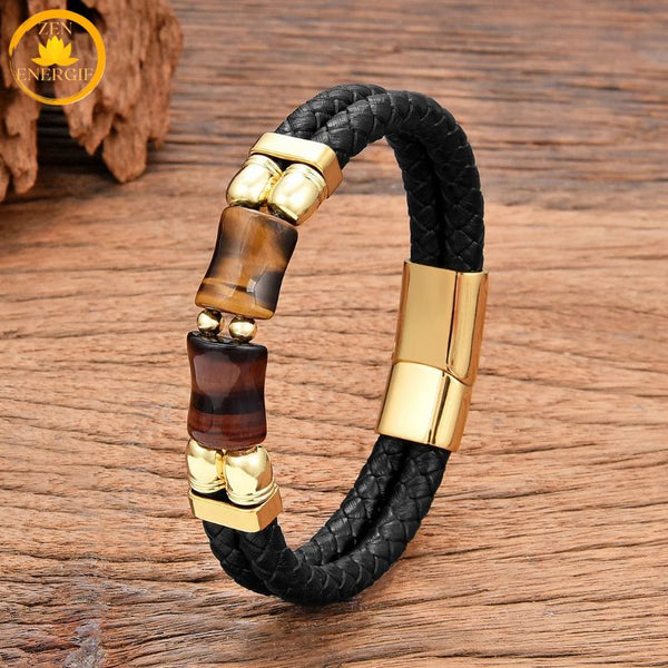 alt="Bracelet homme en cuir tressé noir avec pierres œil de tigre doré et œil de taureau rouge, fermoir doré"
