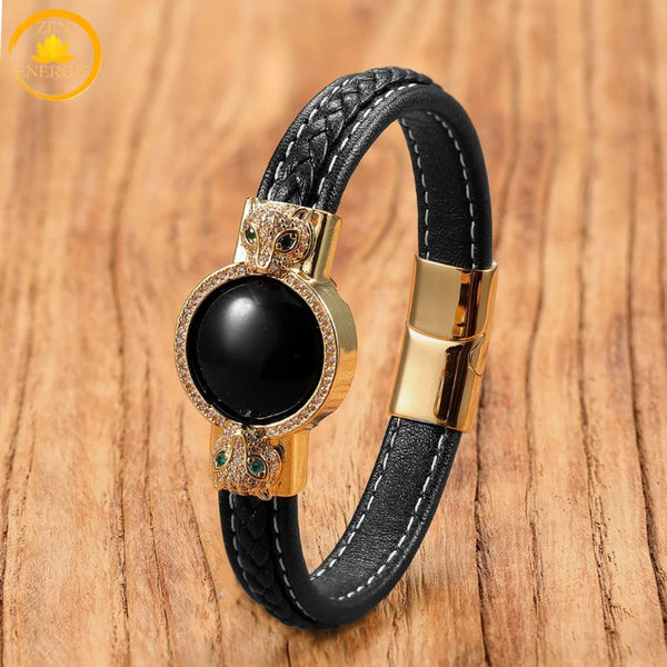 alt="Bracelet en cuir noir avec pierre naturelle onyx noir et fermoir doré motif tête de loup"
