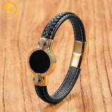 alt="Bracelet en cuir noir avec pierre naturelle agate noire et fermoir doré motif tête de loup"

