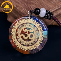 pendentif en orgone rond avec sept chakras∣ Zenbienetre.com