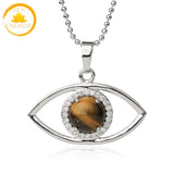 pendentif œil en cristal de roche naturel∣ Zenbienetre.com